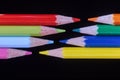 ÃâColorful pencils against a black background Royalty Free Stock Photo