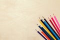 Colorful pencils arrangement on grey background close up Royalty Free Stock Photo