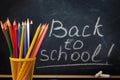 Colorful pencils and blackboard. Royalty Free Stock Photo