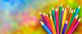 Colorful pencils with colored background