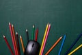 Colorful pencils and computer mouse on desk Royalty Free Stock Photo