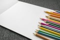Colorful pencils copy space border over white template paper background. Royalty Free Stock Photo