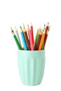 Colorful pencils in cup isolated on a white Royalty Free Stock Photo