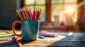 Colorful pencils in cup on table, desk organizer, art and office supplies Royalty Free Stock Photo