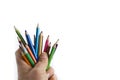 Colorful pencils in hand isolated on white background Royalty Free Stock Photo