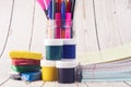 Colorful pencils, markers and pens composition back to school, concept with stationery on a cramped wooden background Royalty Free Stock Photo