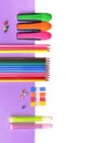 Colorful pencils and neon pens on mauve paper and white Royalty Free Stock Photo