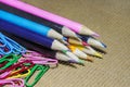 Colorful pencils and paper clips Royalty Free Stock Photo