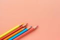 Colorful pencils on pink background Royalty Free Stock Photo