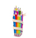 Colorful pencils with ribbon, on white background Royalty Free Stock Photo