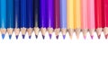 Colorful Pencils in Straight Line on Pure White Background Royalty Free Stock Photo