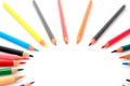 Colorful pencils on white background