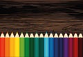 Colorful pencis. Vector on wooden background Royalty Free Stock Photo