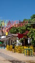 Colorful pennant flags over the street in Zipolite