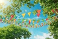 colorful pennant string decoration in green tree foliage on blue sky, summer party background. Royalty Free Stock Photo