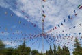 Colorful pennants flags hanging over blue sky. Festival or party concept Royalty Free Stock Photo