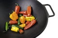 Colorful Peppers in Cast Iron Wok Royalty Free Stock Photo
