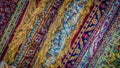 Colorful Persian rug edges with fringes lined up diagonally