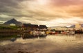 A colorful perspective of fishing boats in a harbor on the west coast of Iceland with a cloudy and dramatic sky Royalty Free Stock Photo