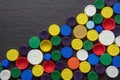 Colorful PET bottle caps on black background Royalty Free Stock Photo