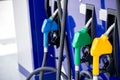 Colorful Petrol pump filling nozzles Royalty Free Stock Photo