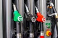 Colorful Petrol pump filling nozzles , Gas station in a service Royalty Free Stock Photo