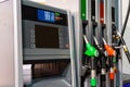 Colorful Petrol pump filling nozzles , Gas station in a service in daytime Royalty Free Stock Photo