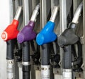 Colorful Petrol pump filling nozzles, Gas station in a service in daytime Royalty Free Stock Photo