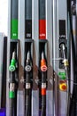 Colorful Petrol pump filling nozzles , Gas station in a service in daytime Royalty Free Stock Photo