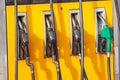 Colorful Petrol pump filling nozzles, Gas station in a service Royalty Free Stock Photo