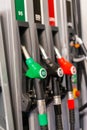 Colorful Petrol pump filling nozzles , Gas station in a service Royalty Free Stock Photo