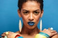 Colorful photo of strict serious mixed-race woman with trendy ma