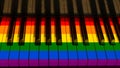 Colorful piano keyboard with keys in hues of rainbow.