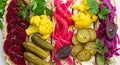 Colorful pickled vegetables arranged on bread slices create an appetizing food display Royalty Free Stock Photo