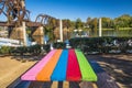 A colorful picnic table and a beautiful blue sky