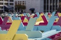 Colorful picnic tables upside down in a park