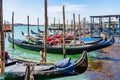 Colorful picture with gondolas moored on Grand Canal near Saint Mark square, in Venice Italy Royalty Free Stock Photo