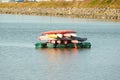 Colorful pile of Kayaks in the water Royalty Free Stock Photo