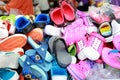 Colorful pile shoes in the market.