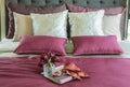 Colorful Pillow and decorative tray on the bed Royalty Free Stock Photo