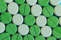 Colorful pills background. Green and white drugs.