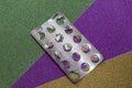 Colorful pills in blister silver, vitamin C, various trace elements