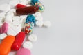 Colorful pills closeup on white background