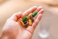 Colorful pills and medicines in the hand Royalty Free Stock Photo