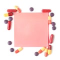 Colorful pills and paper for notes