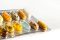 Colorful pills in transparent medicine capsule isolated on white background, illness disease medicine concept Royalty Free Stock Photo