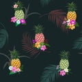 Colorful pineapple with tropical flowers and leaves seamless pattern on dark summer night background