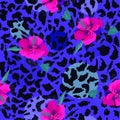 Colorful pink blooming flower on animal skin leopard prints sea