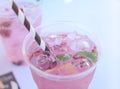 Colorful pink gin tonic cocktail ready for party Royalty Free Stock Photo