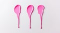 Colorful pink paint drips on surface Royalty Free Stock Photo
